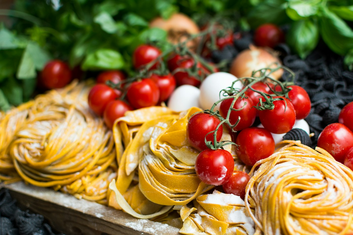 Fresh pasta with tomatoes and basil