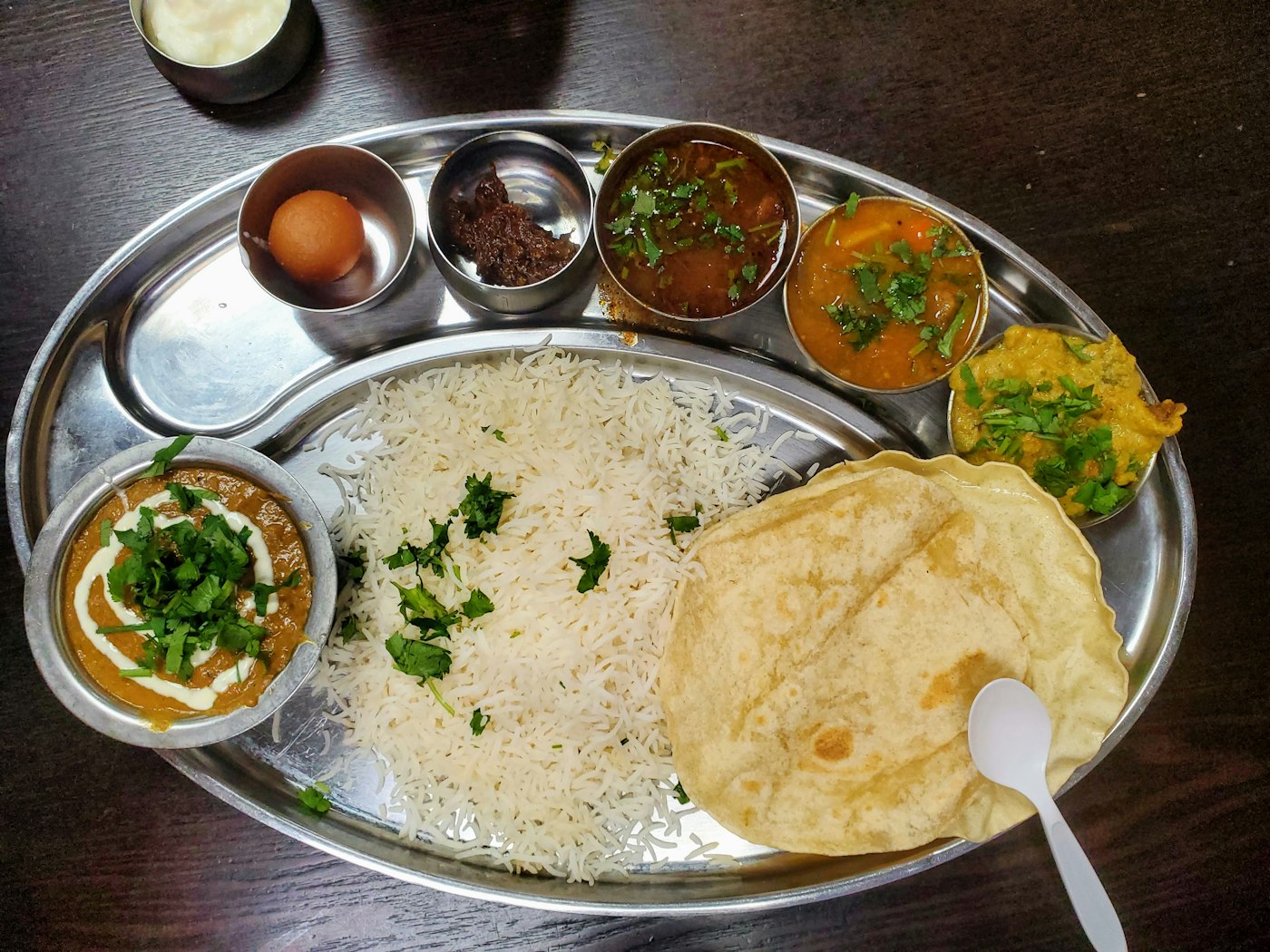 South Indian meals served on a steel thali
