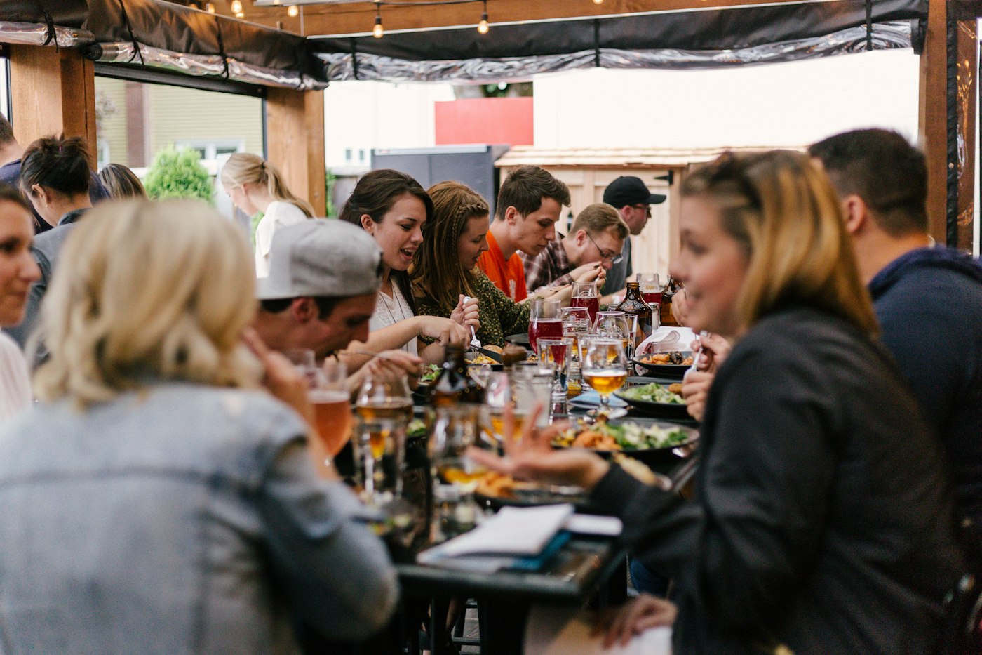 Family and friends sharing a long table